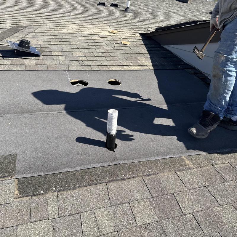 Roof vent flashing installation on shingle roof Roof vent flashing installation on shingle roof