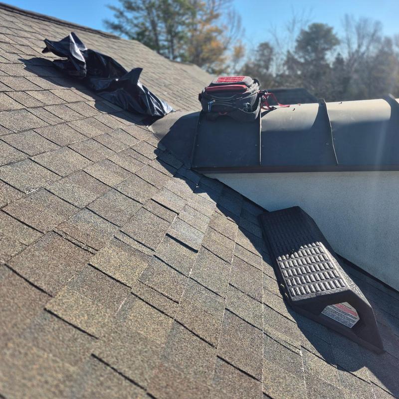 Radius barrel copper dormer roof valley with shingles