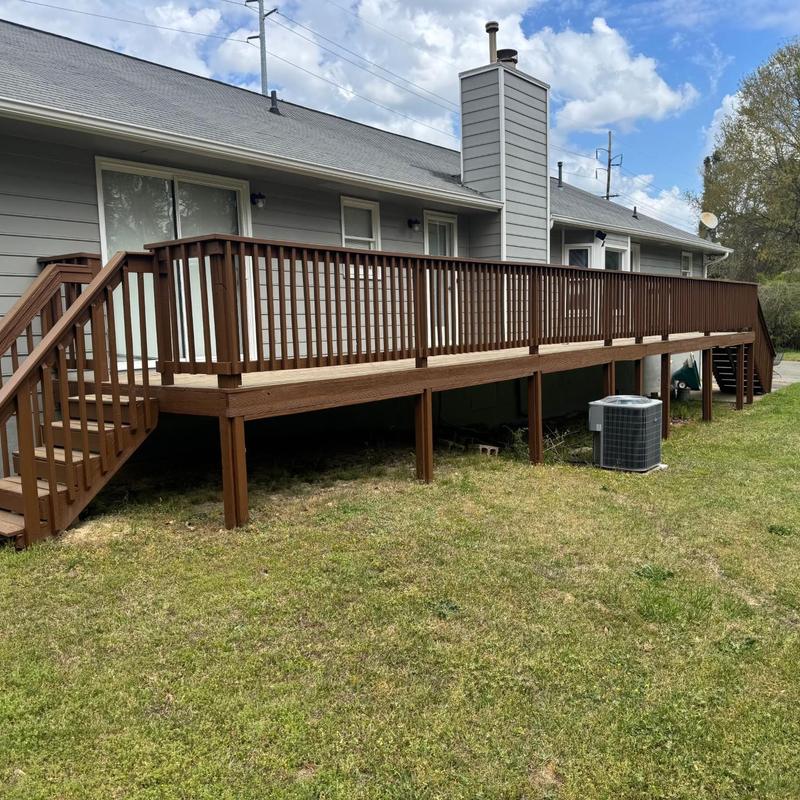 Wooden deck with railing on residential house