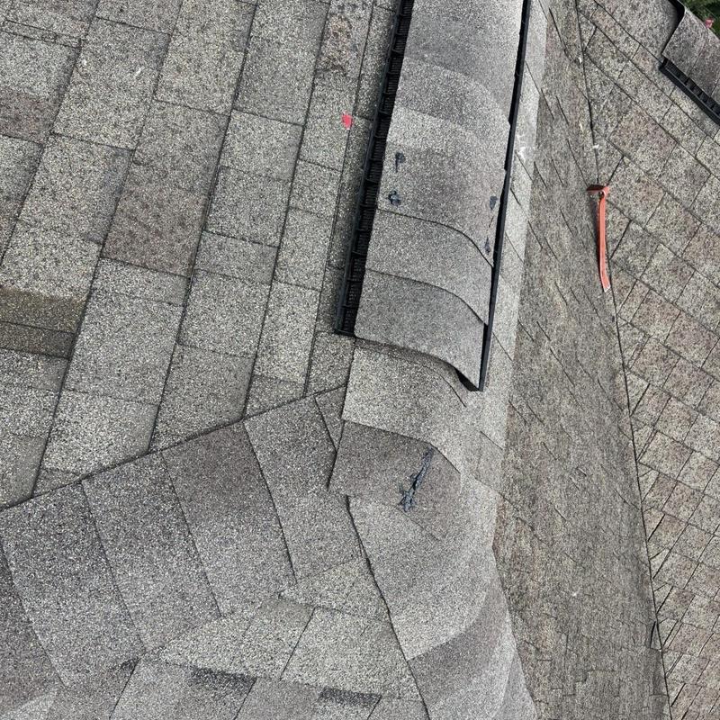 Ridge vent and architectural shingle roof repair