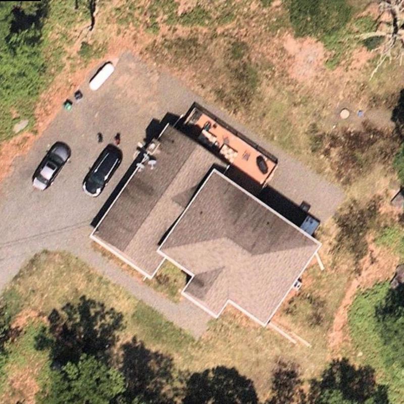 Asphalt shingle roof inspection on residential home Asphalt shingle roof inspection on residential home