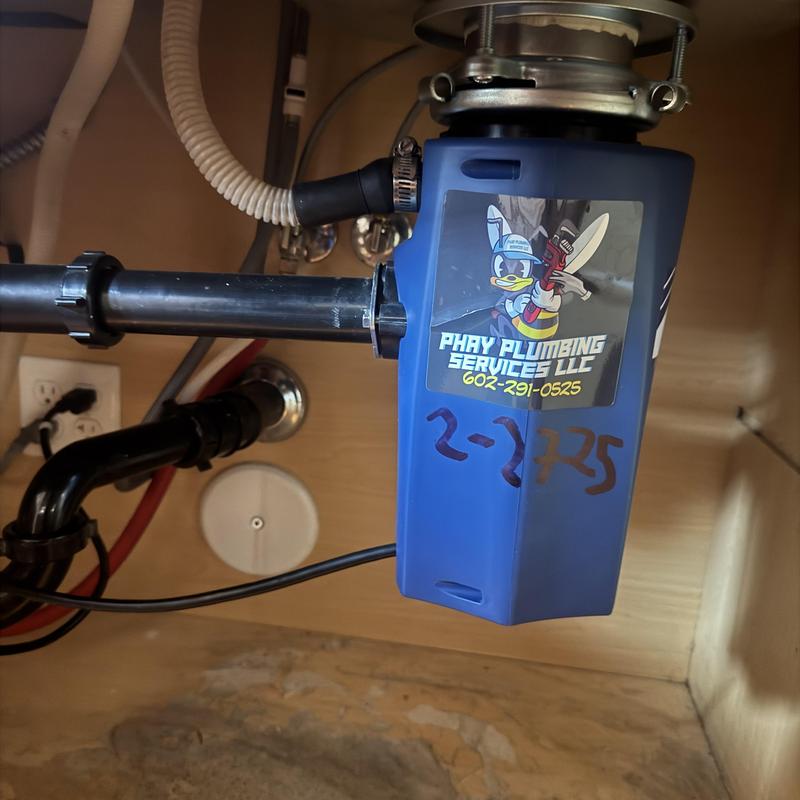 Garbage disposal installation under kitchen sink Garbage disposal installation under kitchen sink