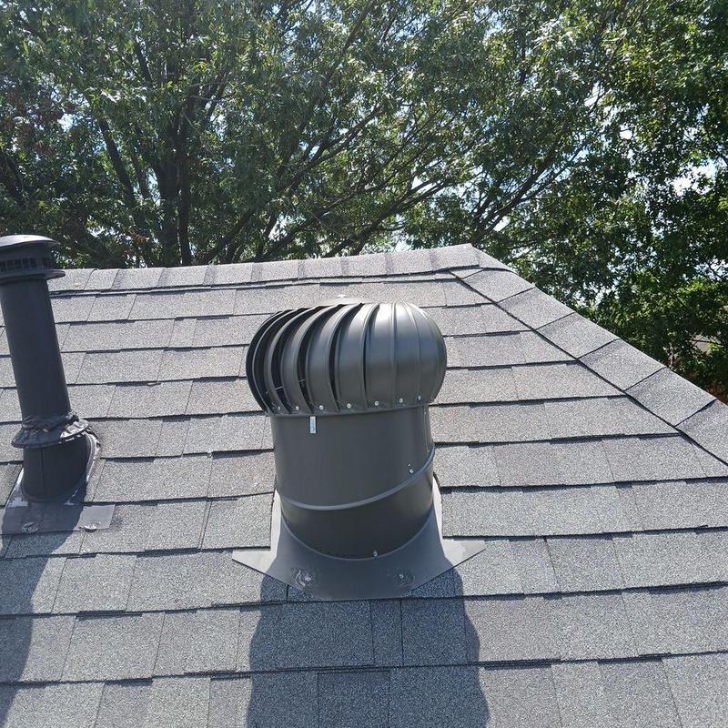 Turbine roof vent on asphalt shingle roof