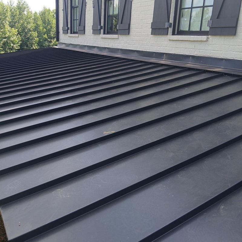 Standing seam metal roof with new counter flashing