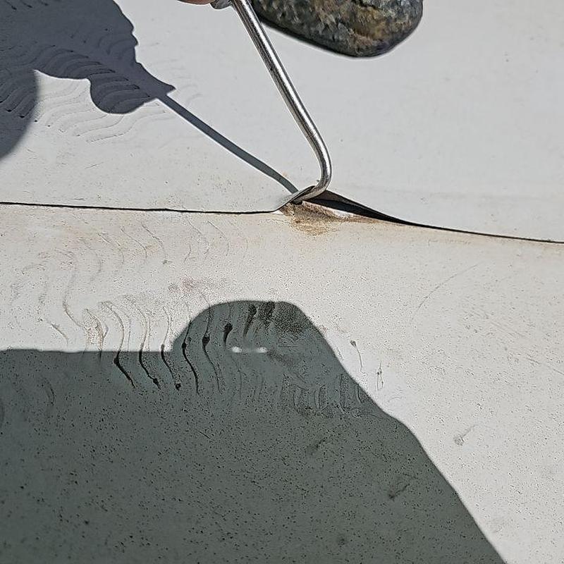 TPO flat roof seam inspection with heat welding tool