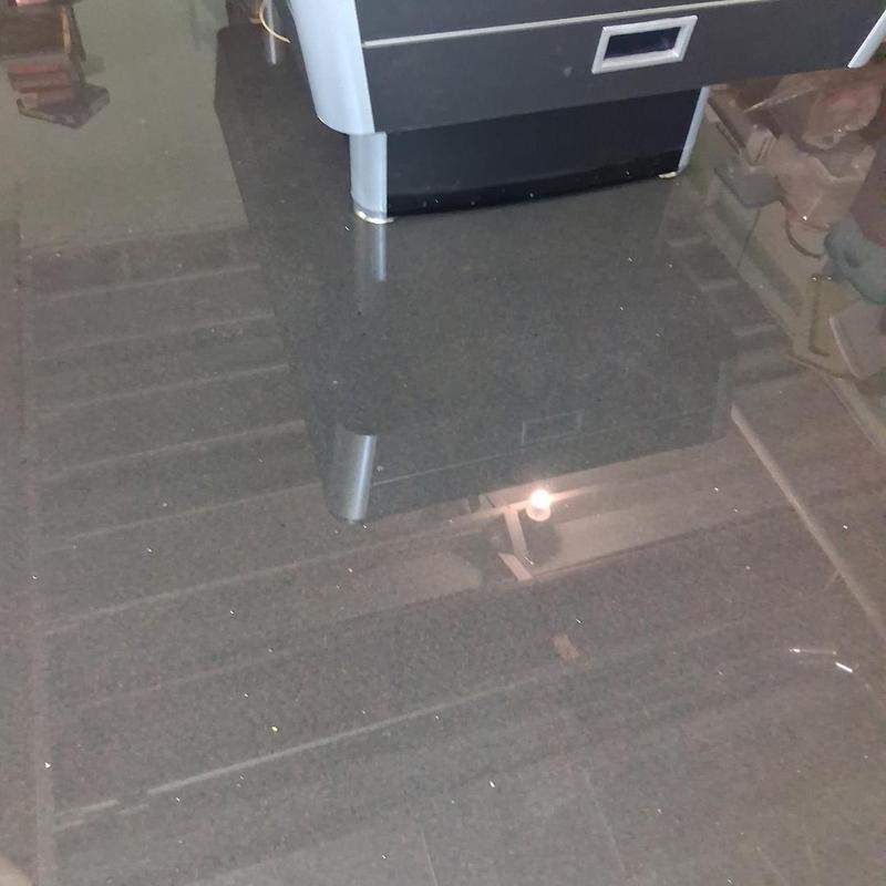 Basement flooding with water reflecting furniture legs