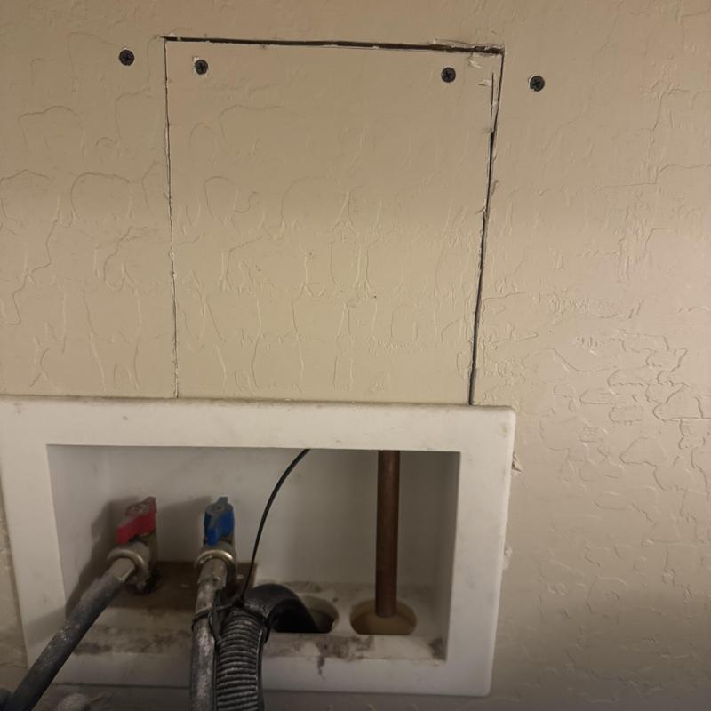 Laundry box discharge tube extension near water valves Laundry box discharge tube extension near water valves