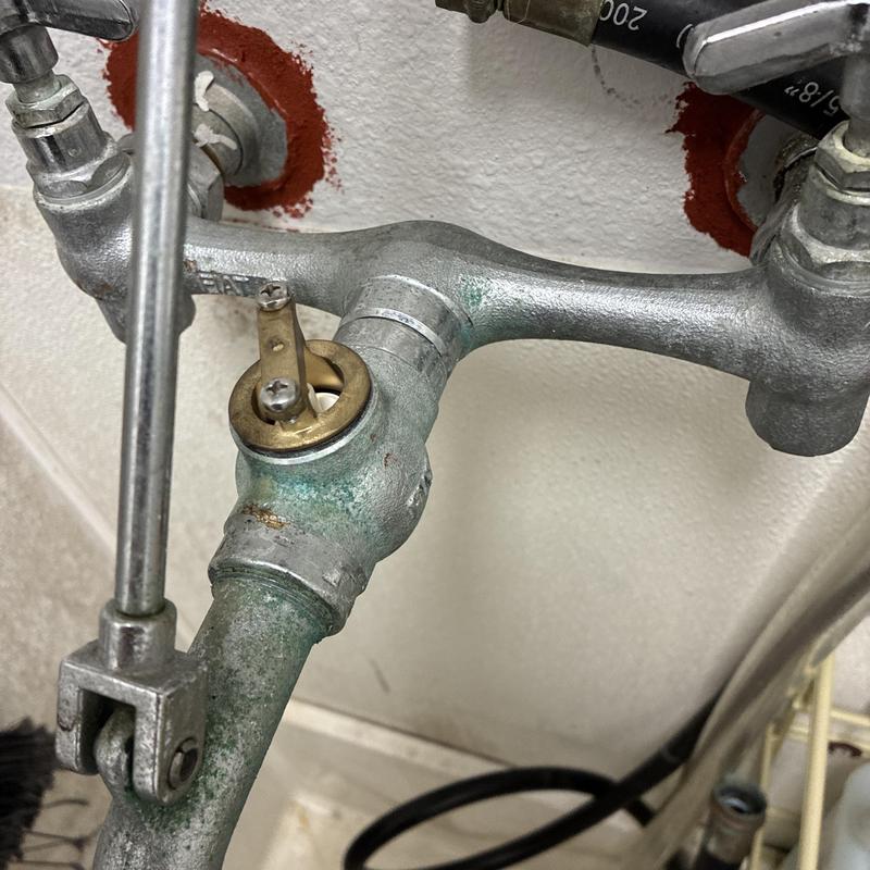 Commercial mop sink faucet valve assembly close-up