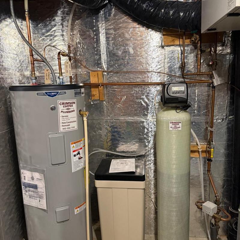 Water heater and softener system with repiping setup