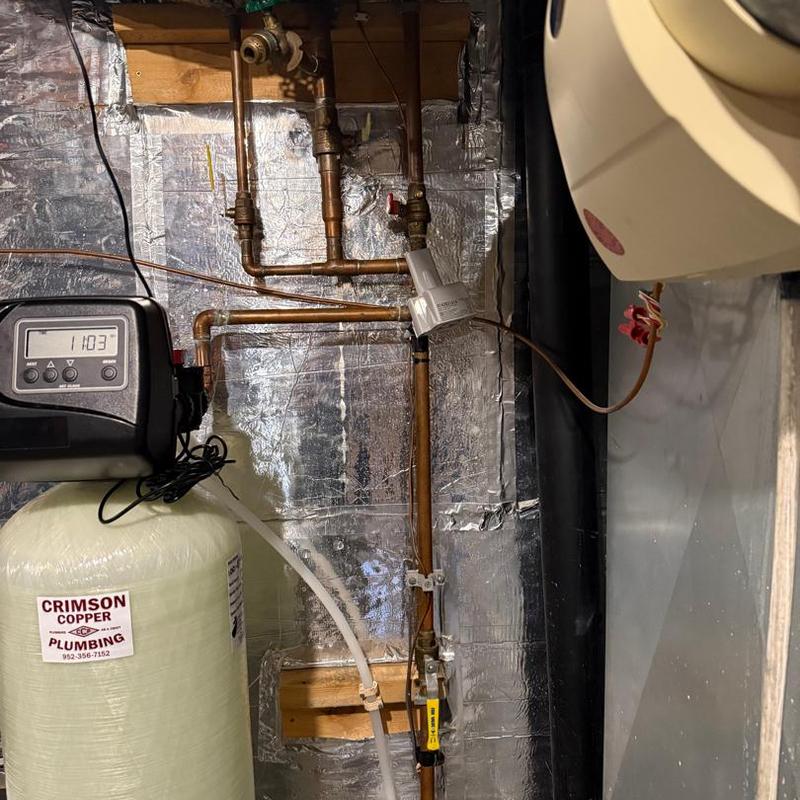 Water softener system with copper repiping and timer