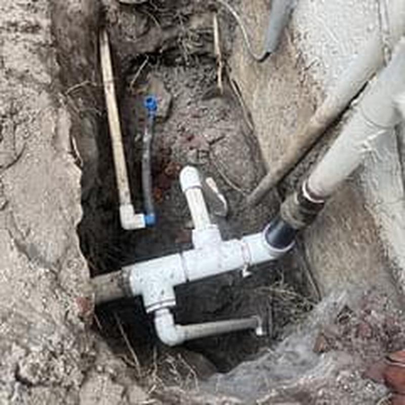 Schedule 40 PVC piping connected to copper main line trench
