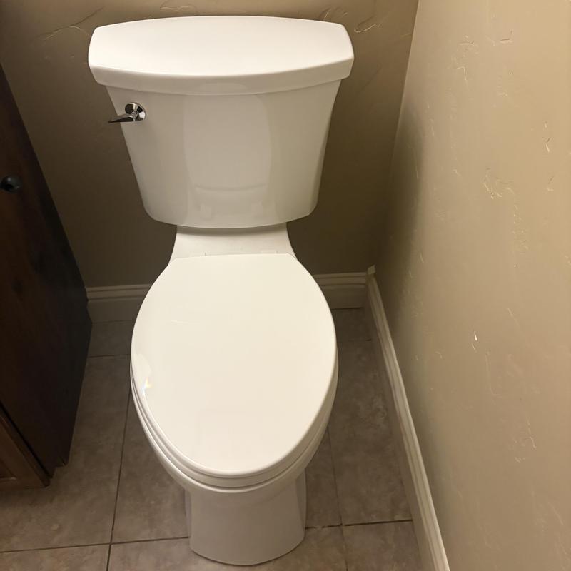 Toilet supply line leak inspection in bathroom corner Toilet supply line leak inspection in bathroom corner