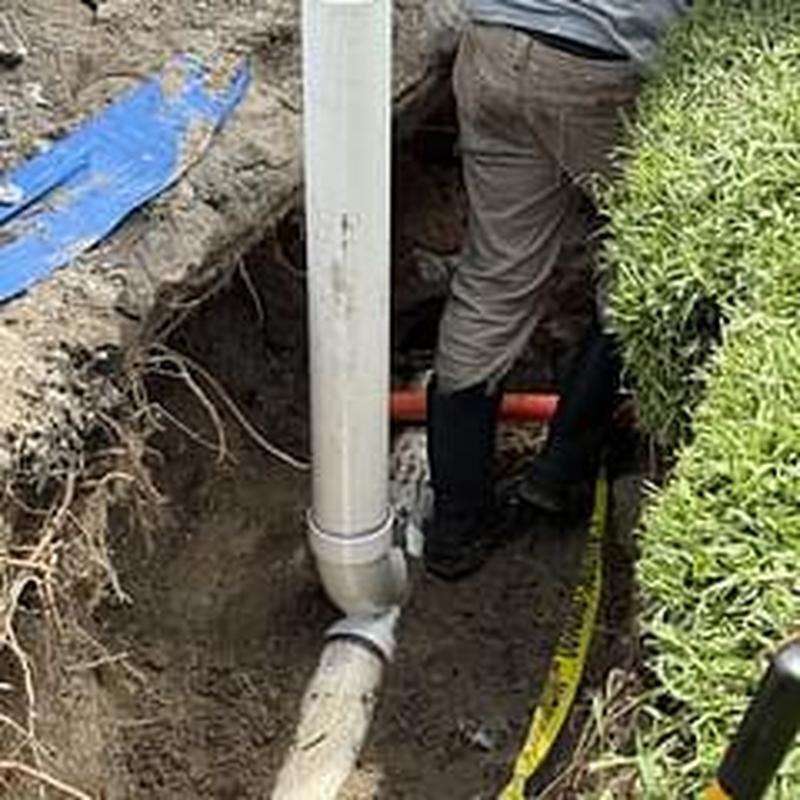 Clay sewer pipe excavation and repair in yard