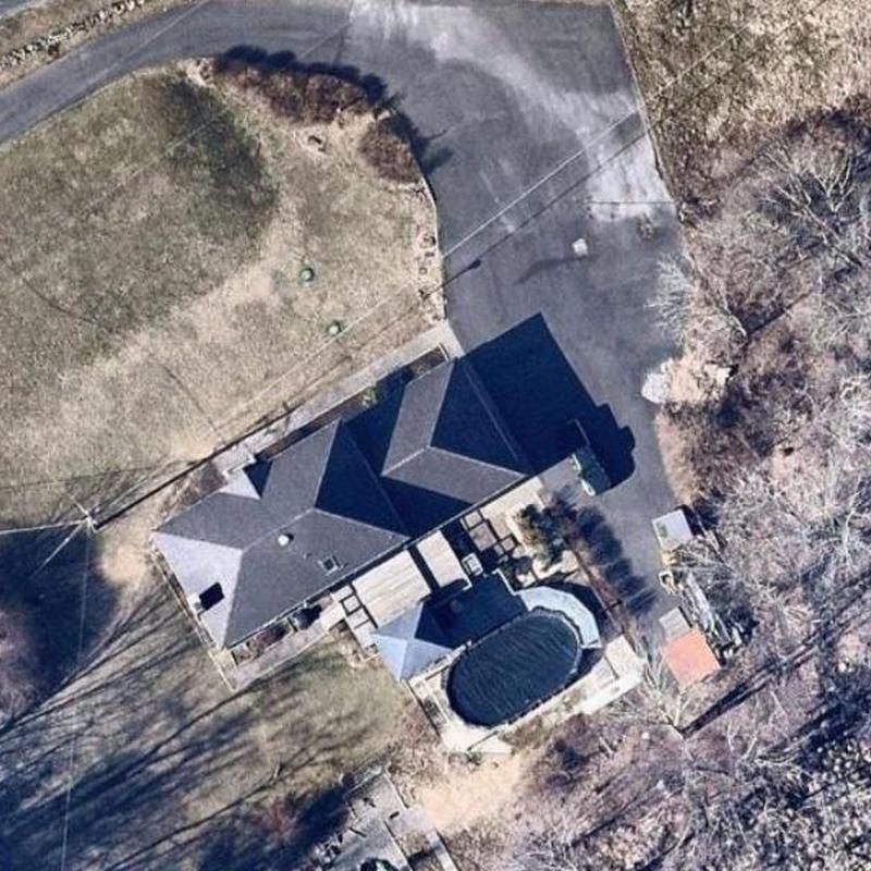 Roof shingles inspection on residential home aerial view Roof shingles inspection on residential home aerial view