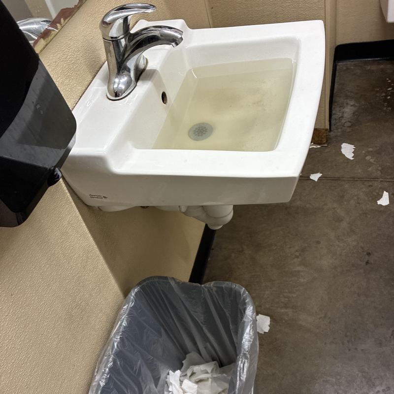 Commercial sink with slow drainage and water backup