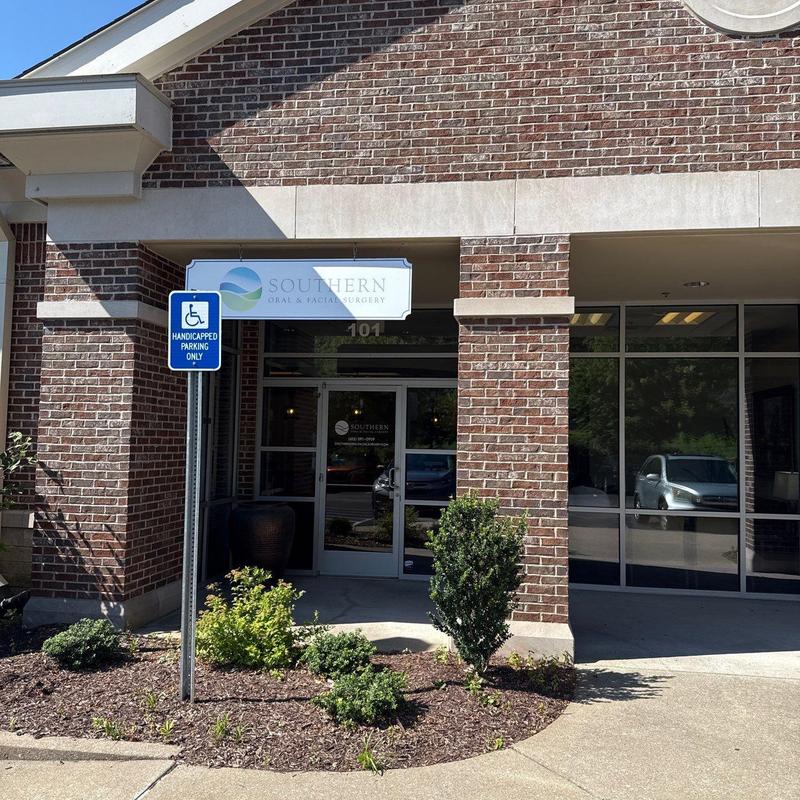 Commercial roofing system with hail damage at entrance