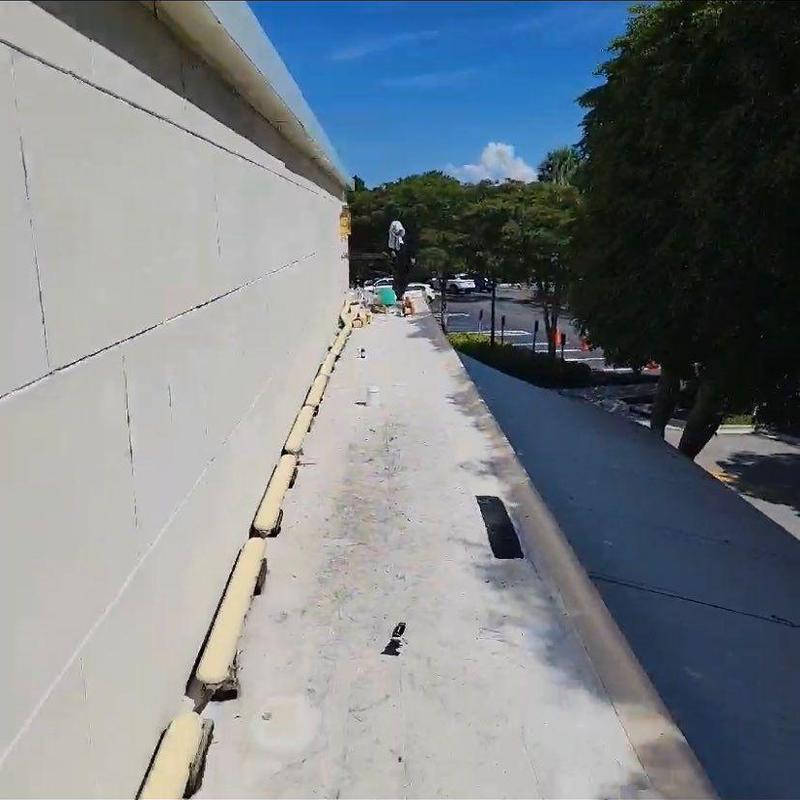 TPO roofing membrane inspection on commercial roof