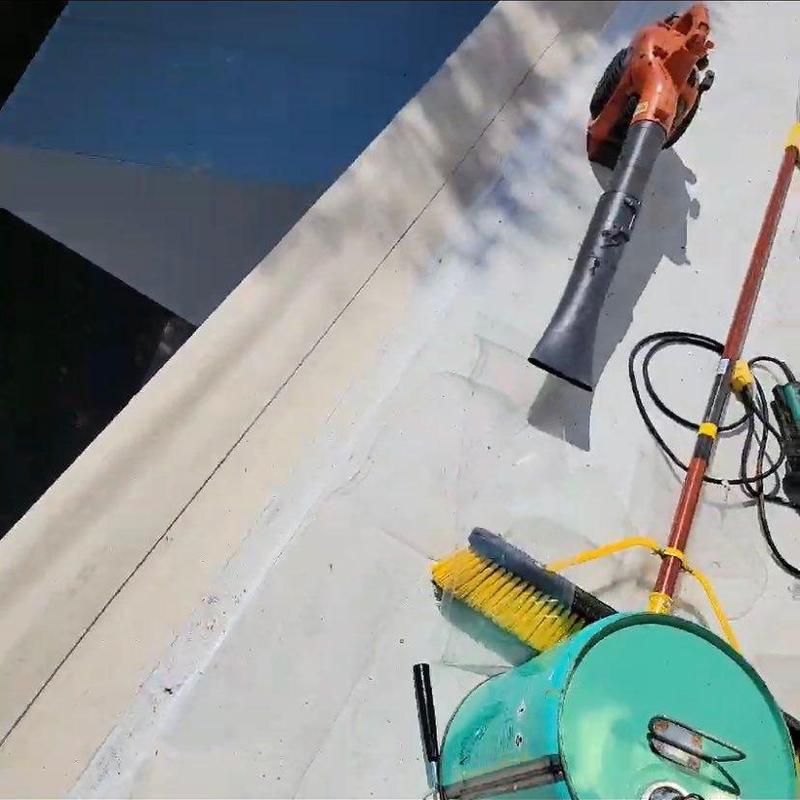 TPO roofing membrane seam cleaning tools on rooftop