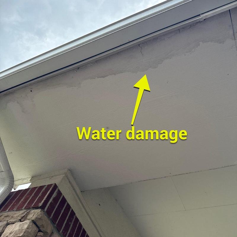 Roof soffit with water damage and cracks