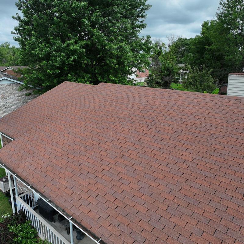 Asphalt shingle roof with hail damage inspection
