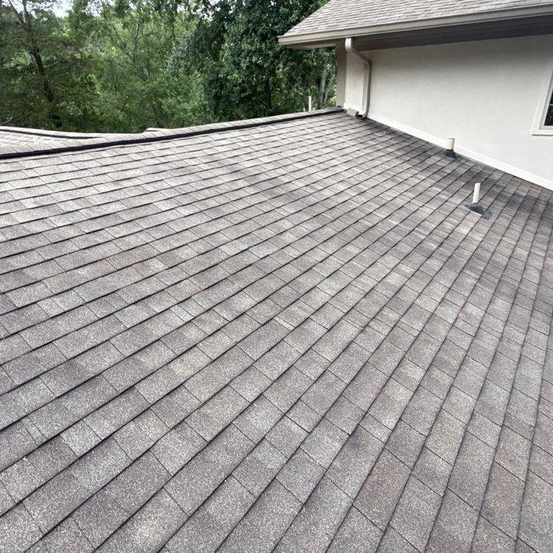Asphalt shingle roof with hail damage inspection