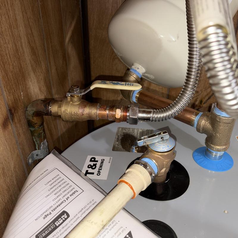 Electric water heater valve and plumbing connections Electric water heater valve and plumbing connections