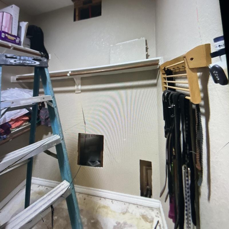 Copper water line rerouted overhead in closet wall Copper water line rerouted overhead in closet wall