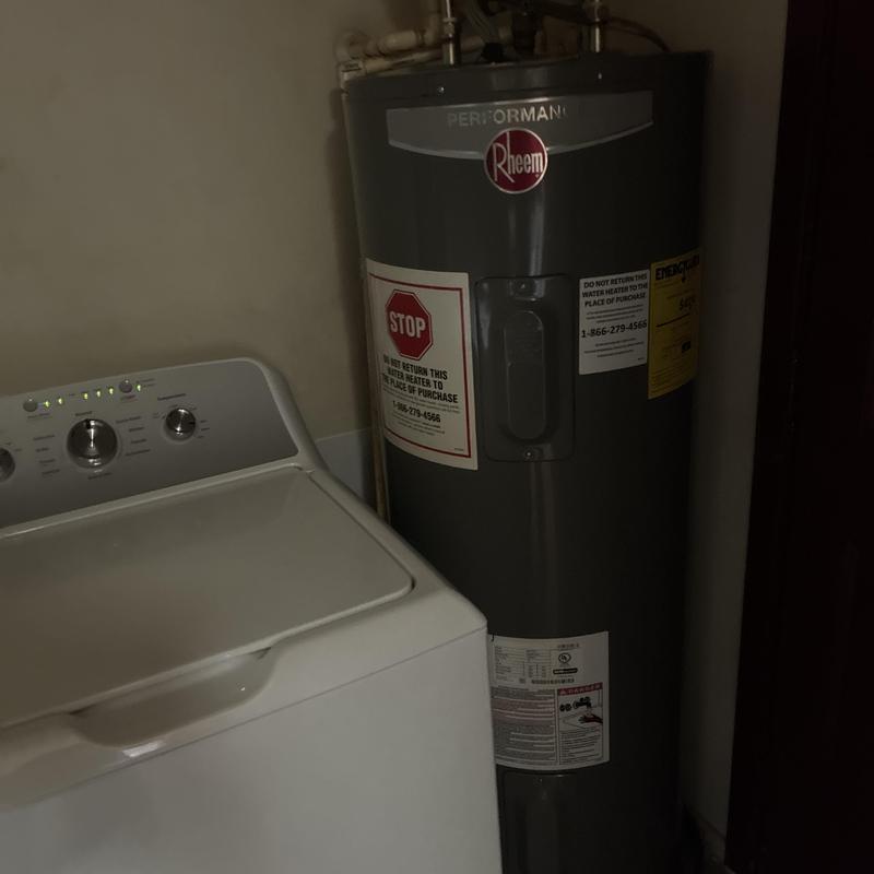Water heater installation next to top-load washer
