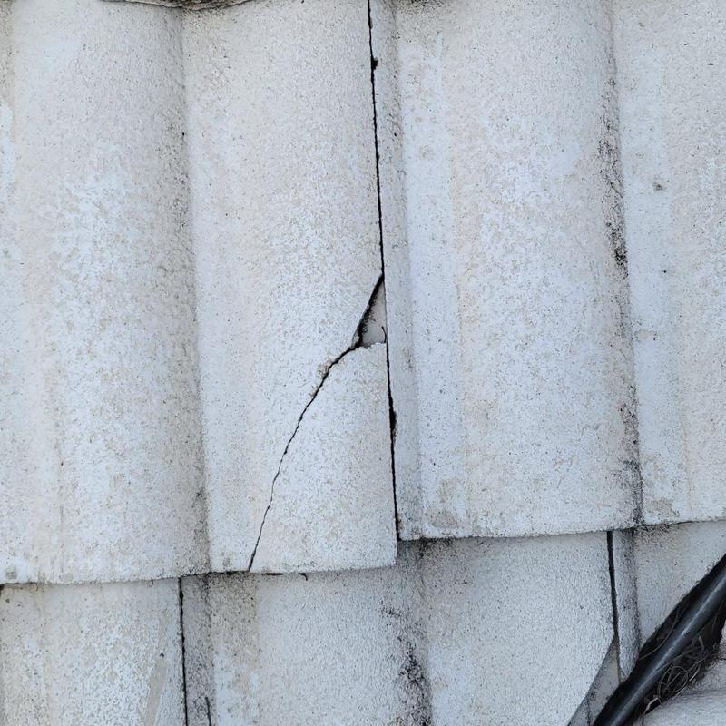 Concrete tile roof cracked tile close-up