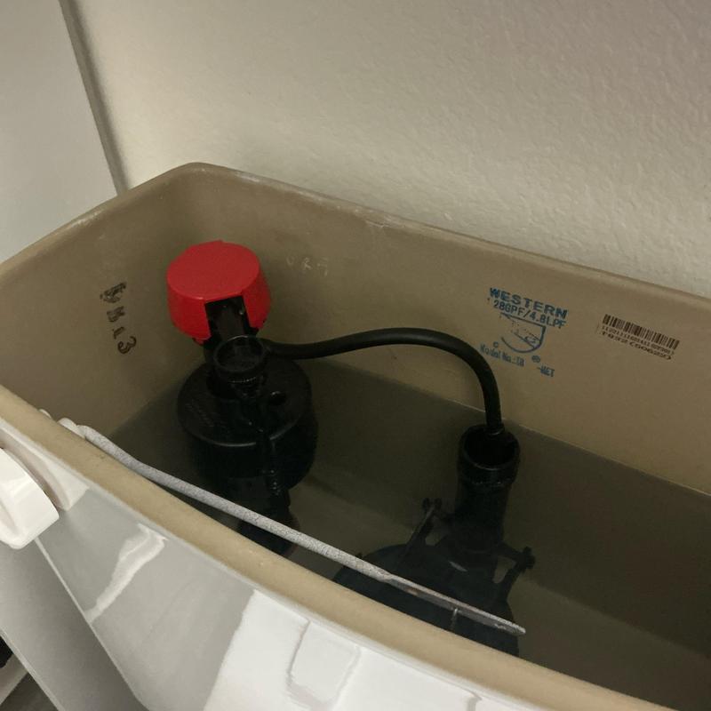 Toilet fill valve and flapper inside tank Toilet fill valve and flapper inside tank