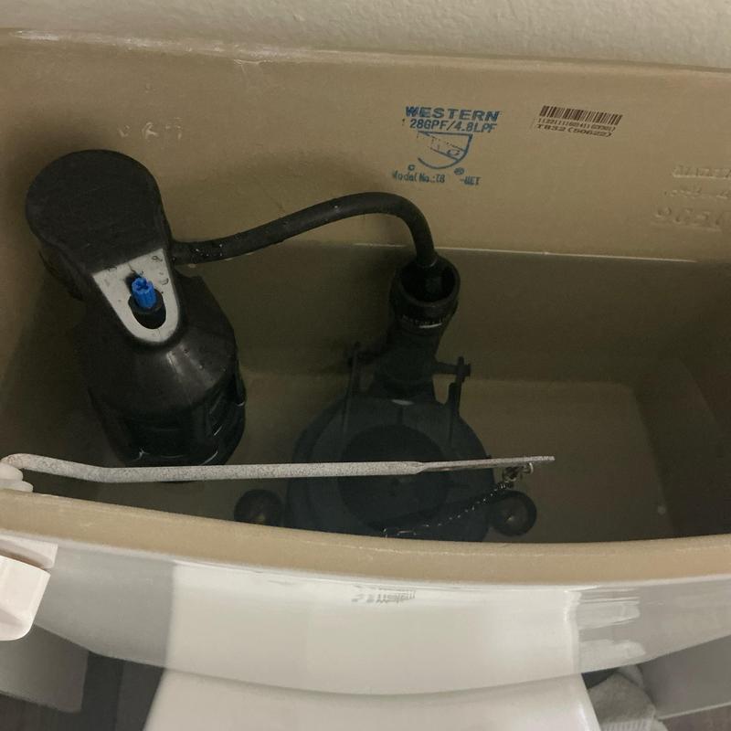 Toilet fill valve and flapper inside tank Toilet fill valve and flapper inside tank