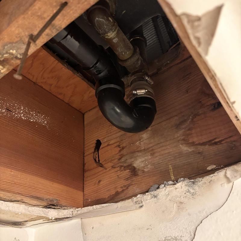 Shower drain P-trap installation with cast iron pipe removal