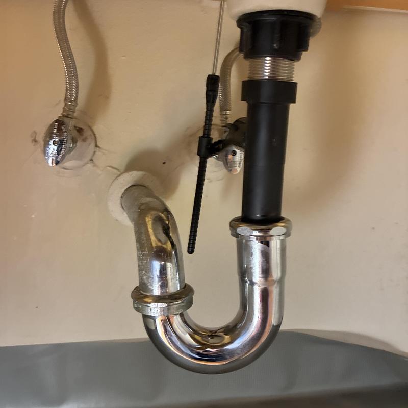 Bathroom sink drain pipe and water supply lines
