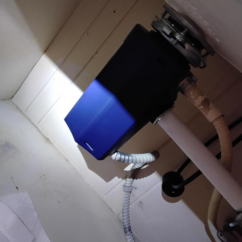 Garbage disposal unit with new plumbing connections Garbage disposal unit with new plumbing connections