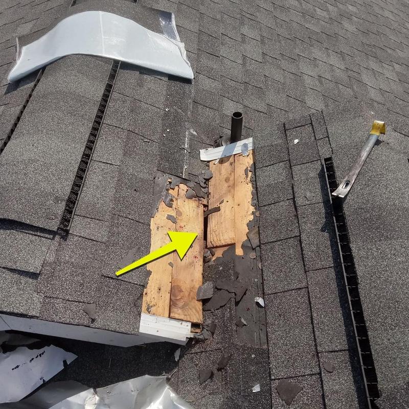 Roof decking with damaged wood and removed shingles