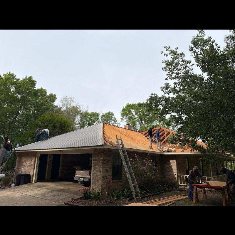 Metal roof removal with exposed wood decking