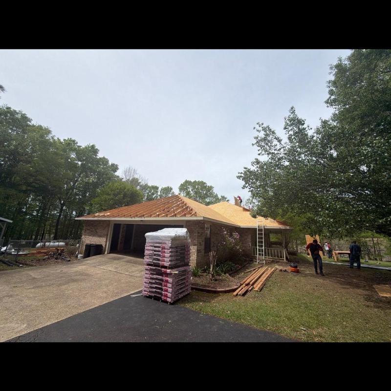 Wood roof decking installation on residential house