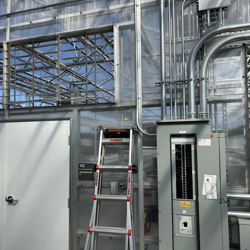Electrical panel and conduit installation inside greenhouse Electrical panel and conduit installation inside greenhouse