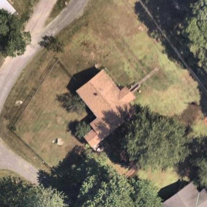 Asphalt shingle roof on older home, aerial view Asphalt shingle roof on older home, aerial view