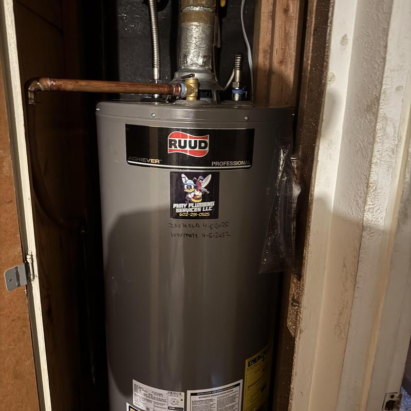 Gas water heater installation with vent pipe connection Gas water heater installation with vent pipe connection