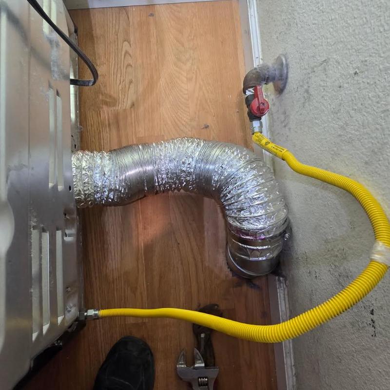 Dryer exhaust vent pipe replacement with gas line connection