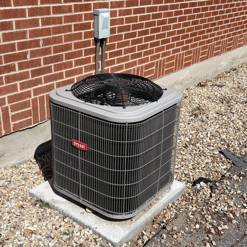 Bryant outdoor air conditioner unit on concrete pad Bryant outdoor air conditioner unit on concrete pad