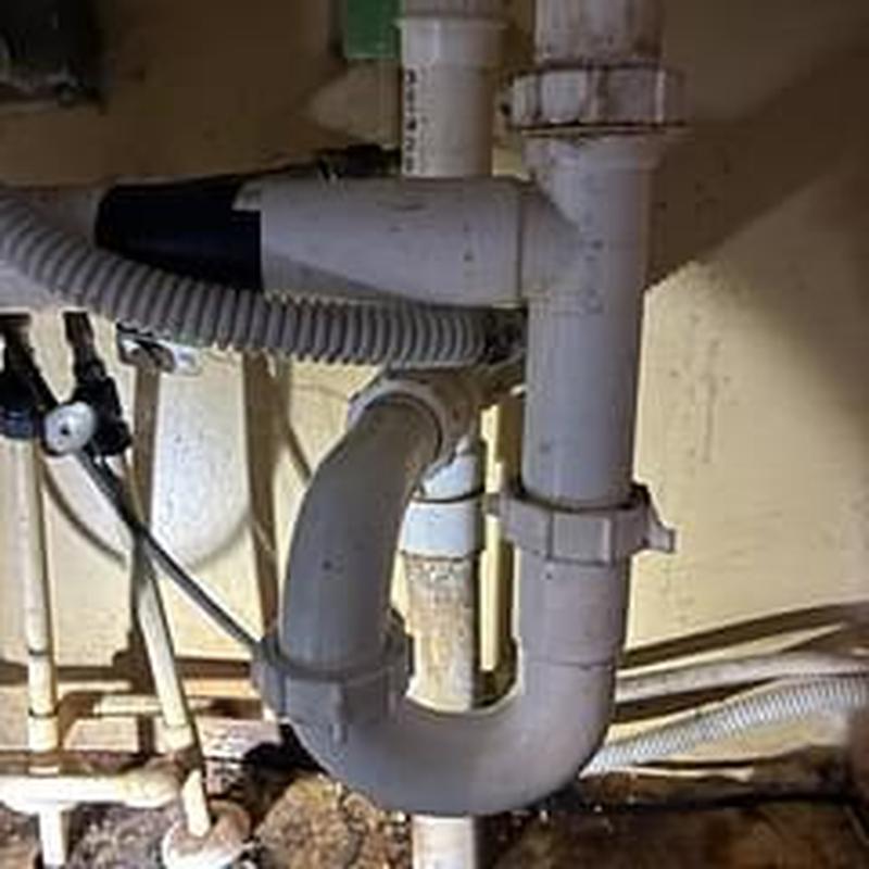 Kitchen sink PVC drain pipe under cabinet