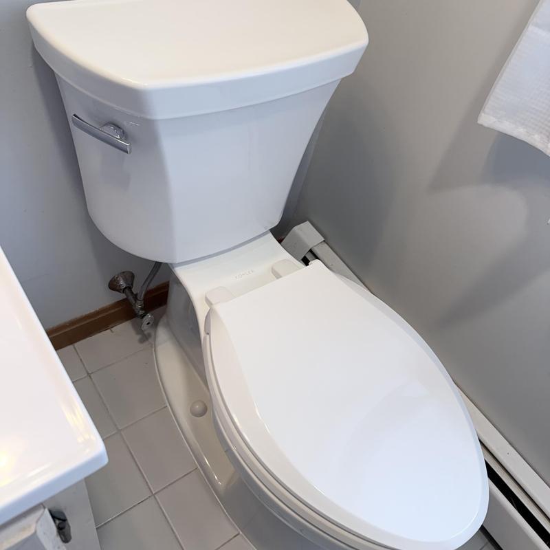 Kohler toilet replacement in bathroom corner Kohler toilet replacement in bathroom corner