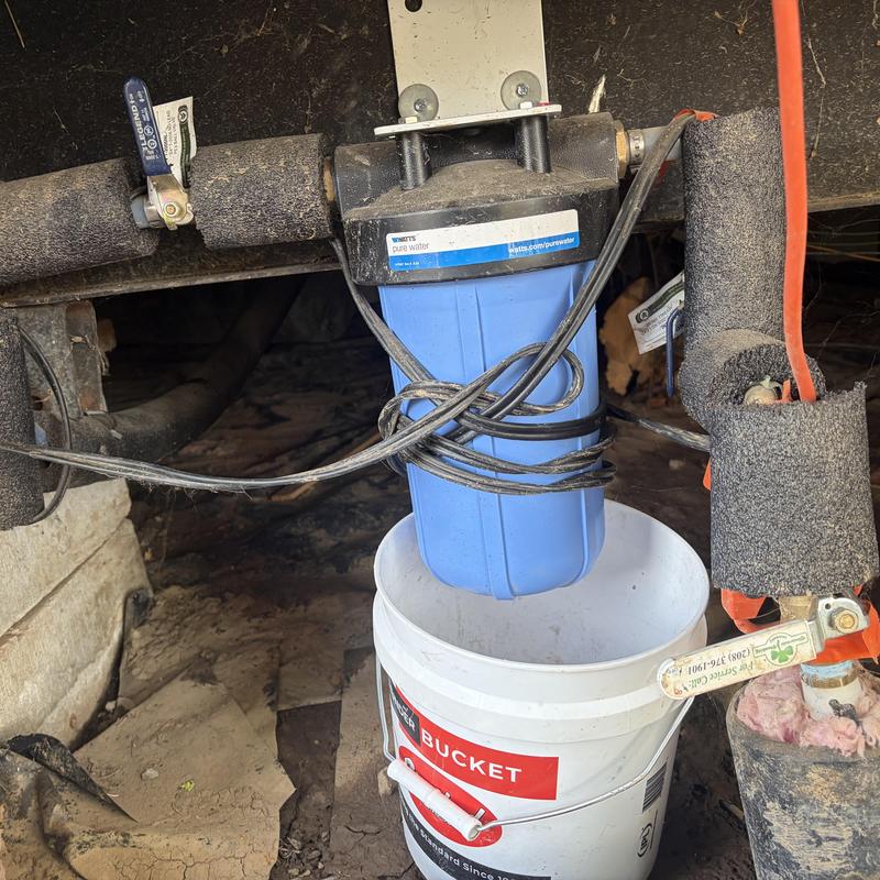 Sediment water filter with replacement filter nearby