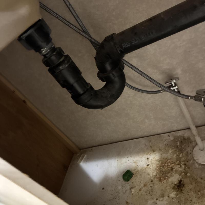 Bathroom sink drain pipe with P-trap assembly