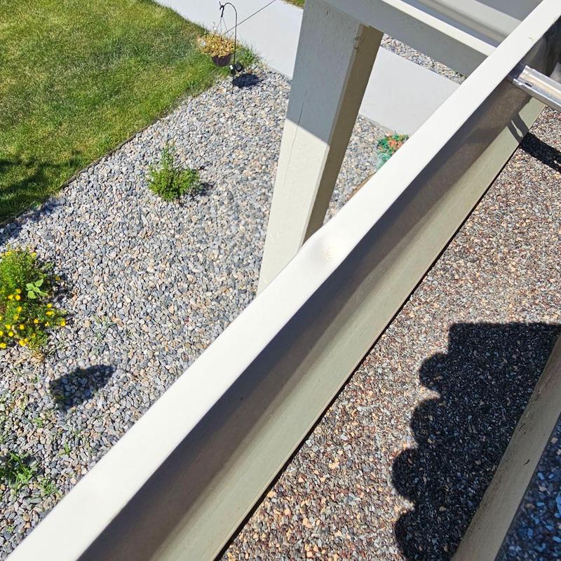 Gutter system inspection and damage overview outdoors