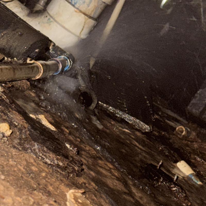 Pressurized pipe fitting leak under home in Mabank, TX