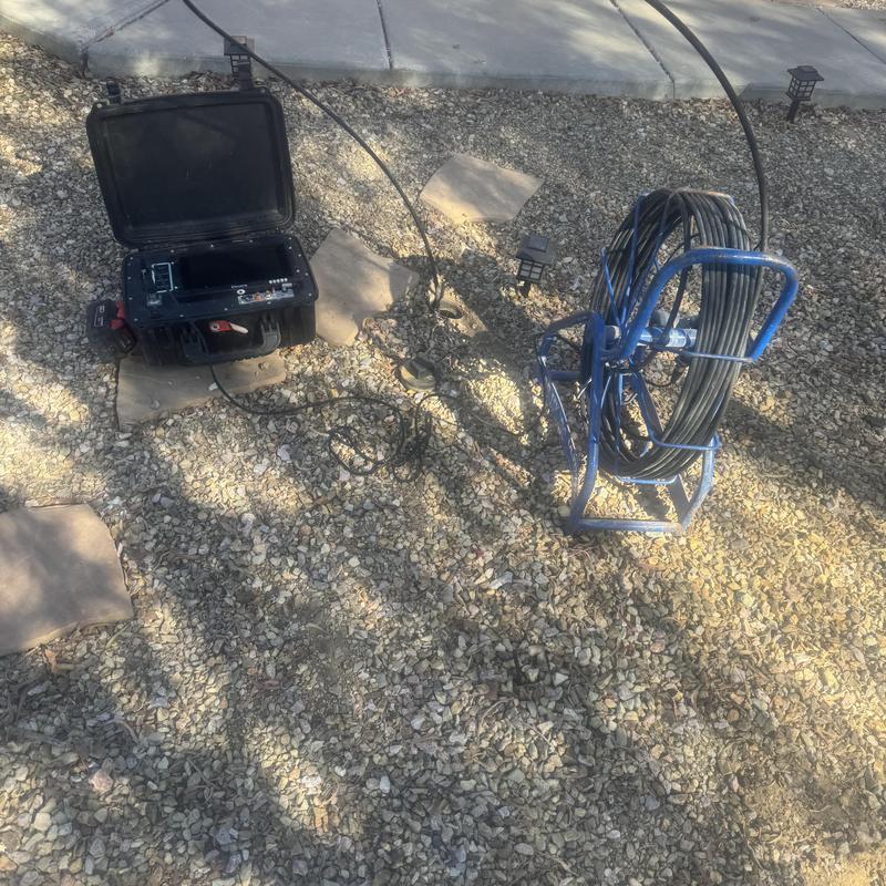 Sewer inspection camera reel and control unit on gravel Sewer inspection camera reel and control unit on gravel