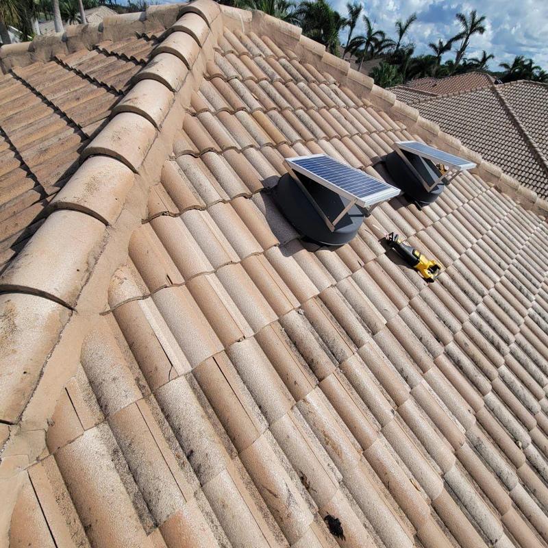 Solar exhaust vents on concrete tile roof Bonita Springs